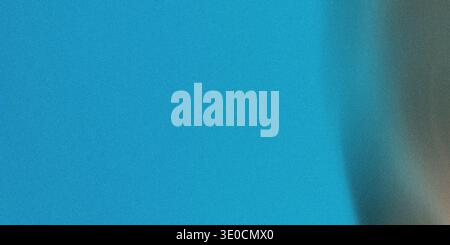 This image features a blurred gradient background transitioning from a vibrant teal to a muted gray. The effect is soft and slightly out of focus. Stock Photo