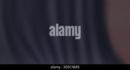 An image featuring a blurred, dark blue vertical texture that resembles fabric or a curtain. The background is out of focus, creating a soft, abstract Stock Photo
