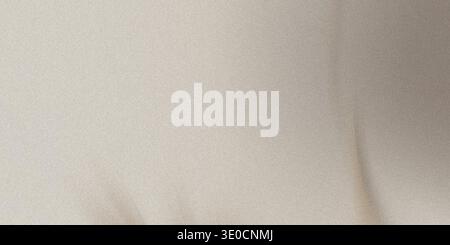 A softly blurred image showcasing a pale beige background. The texture is smooth with subtle variations in tone, creating a calming and understated vi Stock Photo