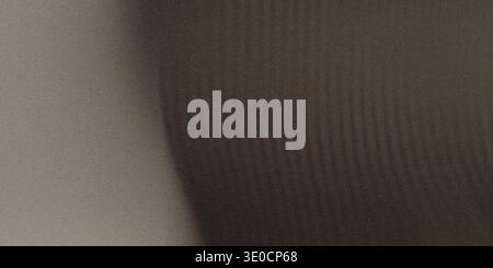 An out-of-focus image showing a gradient blend of light and dark gray tones. The texture is slightly visible, suggesting a possible fabric or wall sur Stock Photo