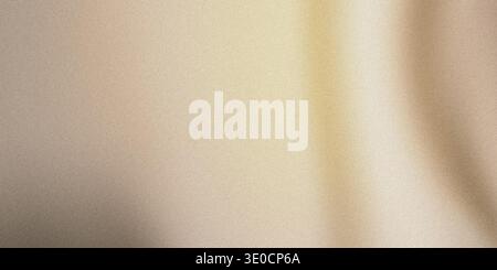 A blurred image showcasing a smooth transition between beige and cream tones. The subtle color variation creates a soft, understated aesthetic. Stock Photo
