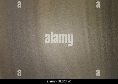 A detailed image showcasing the natural grain of dark brown wood. The texture is smooth with subtle variations in tone and shading, creating a rich, w Stock Photo