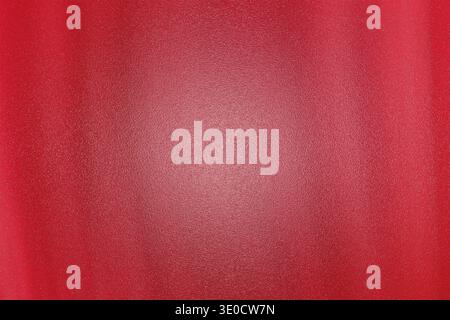 A digitally created image featuring a blurred red gradient background. Vertical streaks are subtly visible, adding texture. The center is slightly lig Stock Photo