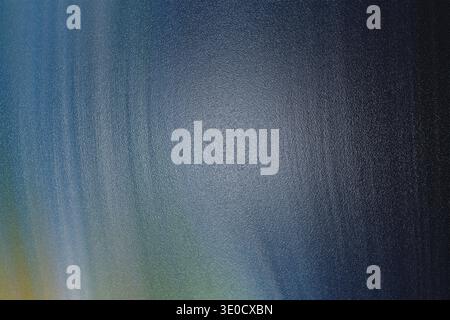A digital image featuring a blurred gradient background with shades of blue and green, creating a smooth, textured effect. The colors transition subtl Stock Photo