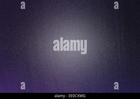 A digitally created abstract background featuring a gradient of dark purple and violet hues with a subtle textured effect. The image is blurred slight Stock Photo