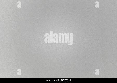 The image shows a light gray background with a subtle, blurred circular area of slightly lighter gray in the center. The overall texture appears smoot Stock Photo