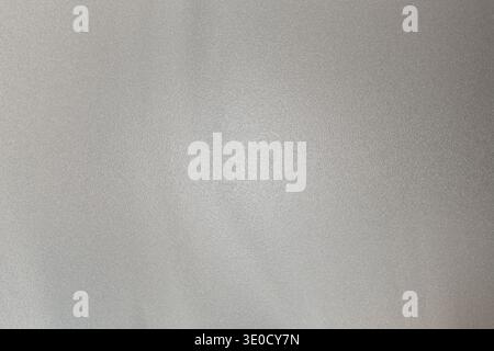A softly blurred image featuring a grayscale gradient, creating a subtle, hazy effect. The lack of sharp focus produces a smooth, ethereal texture. Stock Photo