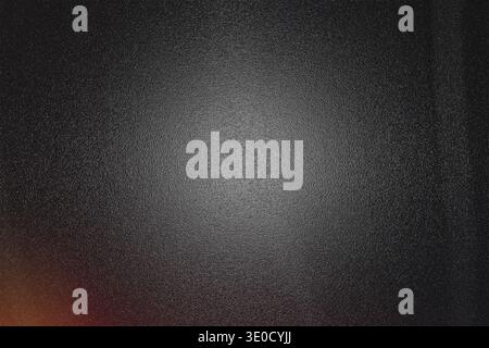 A dark gray background image features a textured surface with a slightly lighter center area and a subtle orange gradient in the bottom left corner. T Stock Photo