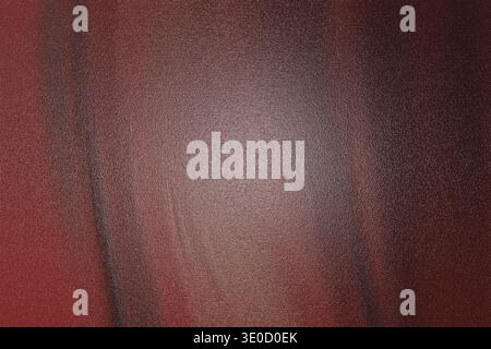 A close-up shot reveals a dark red and burgundy textured background with subtle variations in shading and a slightly blurred effect, creating an abstr Stock Photo
