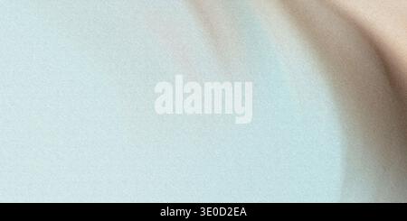 A softly blurred image featuring a gradient of pale blue and beige tones. The texture is smooth and the colors are muted, creating a tranquil and sere Stock Photo