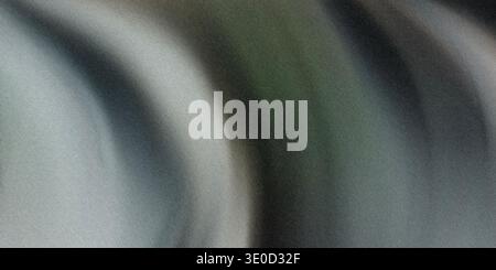 A digitally created abstract image featuring a blurred blend of grey and green tones, creating a swirling, motion-like effect. The colors are muted an Stock Photo