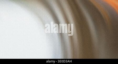 This image showcases a soft, blurred gradient transitioning from a bright white to a muted brown. The effect creates a smooth, flowing abstract backgr Stock Photo