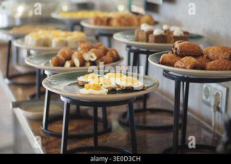Breakfast buffet with various food items on display Stock Photo