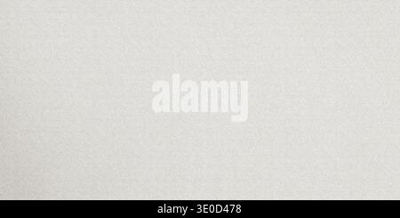 A close-up shot of a plain off-white fabric with a subtle texture. The image is simple and features a uniform color and minimal detail. Stock Photo