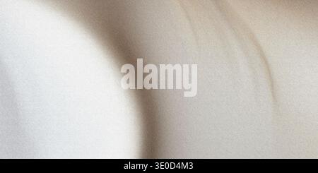 A blurry image showcasing a beige fabric texture with subtle folds and light variations. The background is primarily a muted beige tone. Stock Photo
