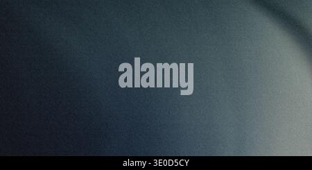 A blurry image featuring a gradient transition from dark blue to a lighter gray tone. The texture is smooth and lacks sharp details. Stock Photo