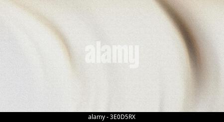 A softly blurred image showcasing the texture of draped off-white fabric. The folds create subtle light and shadow variations. Stock Photo