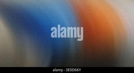 A digitally created abstract image featuring a blurred gradient of blue and orange tones. The colors blend seamlessly, creating a smooth, flowing effe Stock Photo