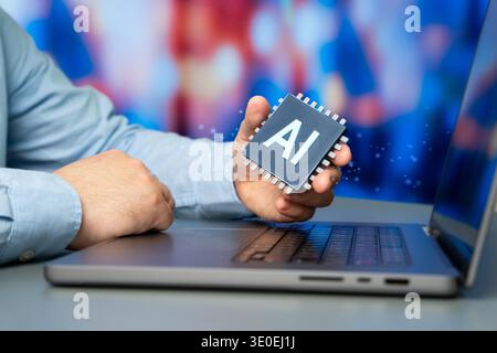 A man holding an AI enabled microchip. Implementing artificial intelligence in business processes to drive automation efficiency and digital transformation. Stock Photo