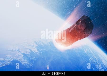 Dramatic large asteroid entering Earth atmosphere. The glowing space rock is heating up with a fiery trail against the backdrop of blue planet Earth a Stock Photo