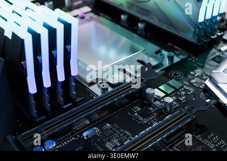 Detailed macro shot of an empty CPU socket on a motherboard during computer assembly. PC hardware upgrade, maintenance, and professional system integr Stock Photo