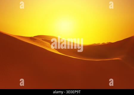 Breathtaking golden desert landscape at sunset. Rolling sand dunes with deep shadows and glowing orange light create a majestic, warm atmosphere. Perf Stock Photo