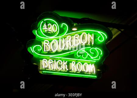 420 Bourbon Brick Room neon sign jazz music nightclub on Bourbon Street, New Orleans nightlife, Louisiana Stock Photo