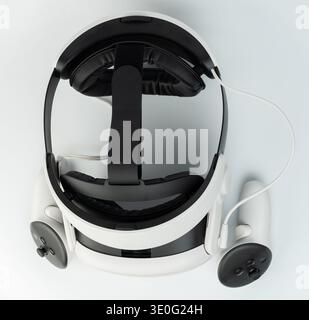 VR goggles with controllers above top view isolated on white studio background Stock Photo
