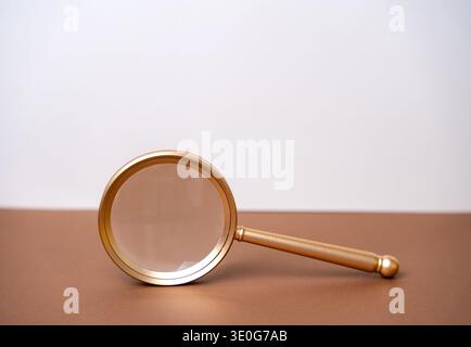 Magnifying glass. Representing searching for ideas, analyzing opportunities, problem solving, innovation, and finding solutions. Symbolizes insight, s Stock Photo