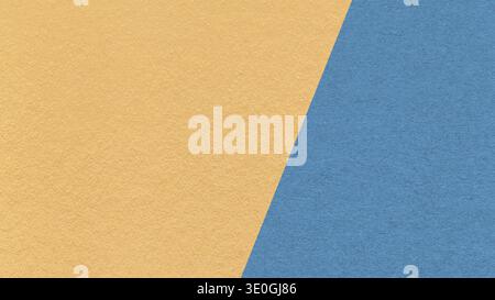 Light ochre texture background with steel blue diagonal angled split and copy space for template, banner, presentation. Stock Photo