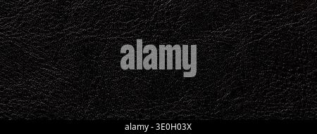 Black leather texture background with embossed grain pattern. Macro surface structure fabric backdrop. Stock Photo