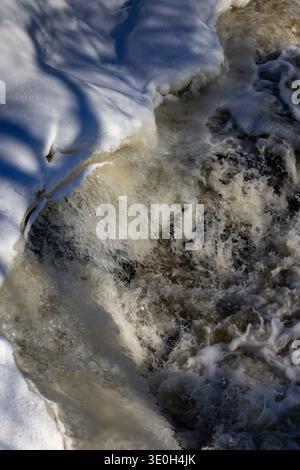 A rapid in winter Stock Photo