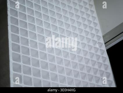 Packaging material made of expanded polystyrene or expanded polyethylene EPE. Model of dense and lightweight EPP, expanded polypropylene material, universal foam. New modern industrial technologies. Stock Photo