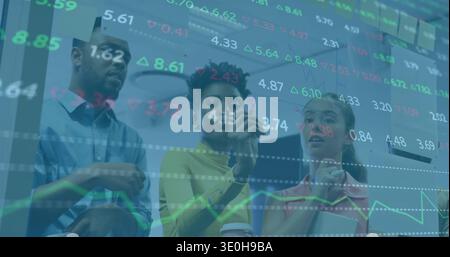 Three analysts in collared shirts reviewing stock charts in meeting room with tablet pen coffee cup. Collaboration, analytics, data, finance, professi Stock Photo