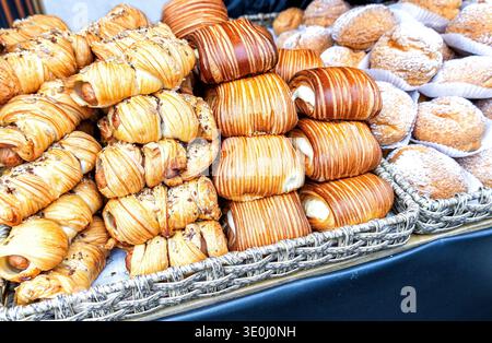 Fresh appetizing pies with various fillings ready for sale Stock Photo