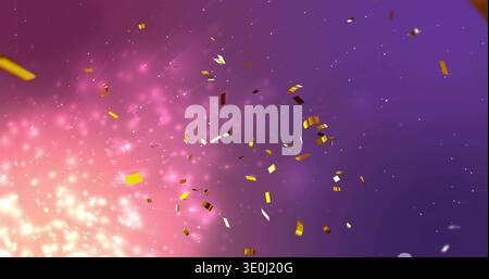 Drifting gold foil strips and curled ribbons shining on purple-pink background, with bokeh glow. Confetti, celebration, shimmer, glitter, metallic, gr Stock Photo