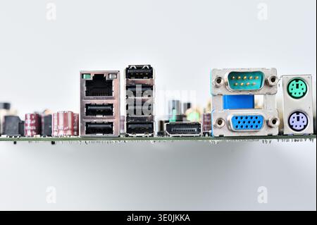Close-up view of computer motherboard ports including USB, Ethernet, and video connectors Stock Photo