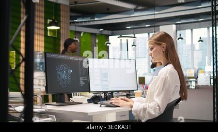 Junior developer optimizing performance using AI LLM chatbot recommendations. Young woman uses artificial intelligence assistant to convert manual workflows into automated scripts, camera A Stock Photo