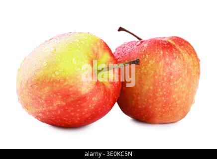 Two fresh, crisp red apples covered in water droplets, isolated on a white background. Perfect for healthy eating, nutrition, and fresh produce concep Stock Photo