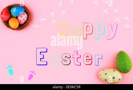 Festive Happy Easter greeting on a pink background featuring colorful painted eggs in a rustic nest, accented with cute bunny and bird footprints. Hig Stock Photo