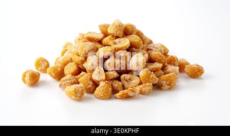 Honey roasted peanuts pile isolated on white background Stock Photo