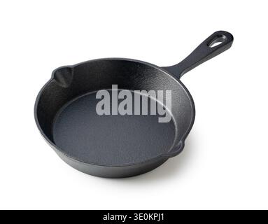 Empty black cast iron skillet frying pan with spout isolated on white background Stock Photo