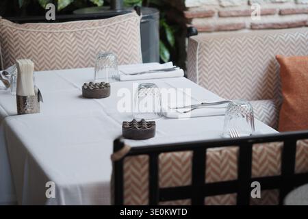 Table set for dining in a restaurant Stock Photo