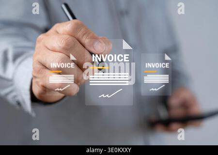 Close-up of a hand using a stylus and tablet with invoice overlays, representing e-invoicing, digital billing, paperless accounting, approval, payment Stock Photo