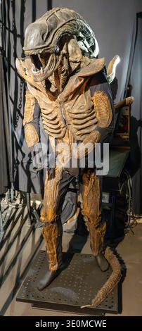 Lyon, France - 7 Jan 24: Full-body alien creature costume from film special effects on display at Musee Cinema et Miniature in Lyon, France. Stock Photo