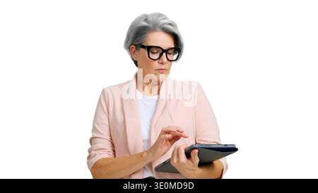 Senior businesswoman using digital tablet on white background Stock Photo