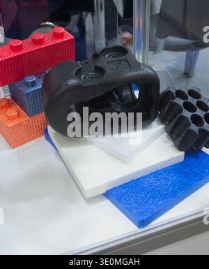 Products made from foamed polymers expanded polypropylene EPP and expanded polystyrene EPS. Model of dense and lightweight material, universal foam. New modern technologies. Industrial manufacturing Stock Photo