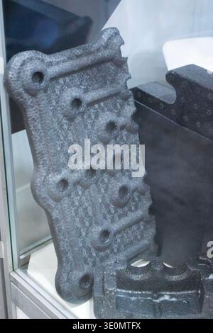 Products made from foamed polymers expanded polypropylene EPP and expanded polystyrene EPS. Model of dense and lightweight material, universal foam. New modern technologies. Industrial manufacturing Stock Photo
