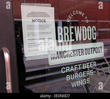 Administration notice on the door of BrewDog Manchester Outpost on Oxford Road, Manchester, stating the premises are closed to the public. Stock Photo