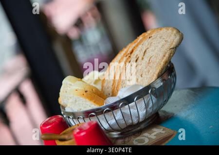 A Bowl Of Assorted Breads On A Table In A Cafe In Istanbul. Stock Photo